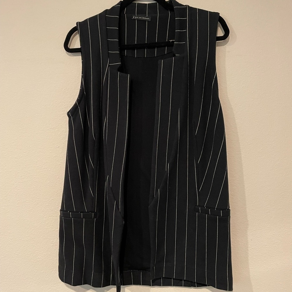 CLOSING SALE! sleeveless vest FYI